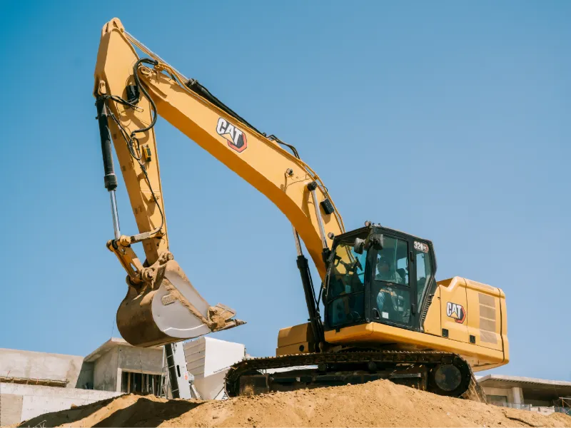 CAT 320GC hydraulic excavator digging on a construction site